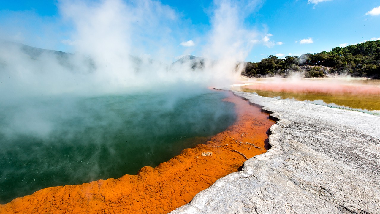 A vibrant coloured sulphur pool letting off steam
